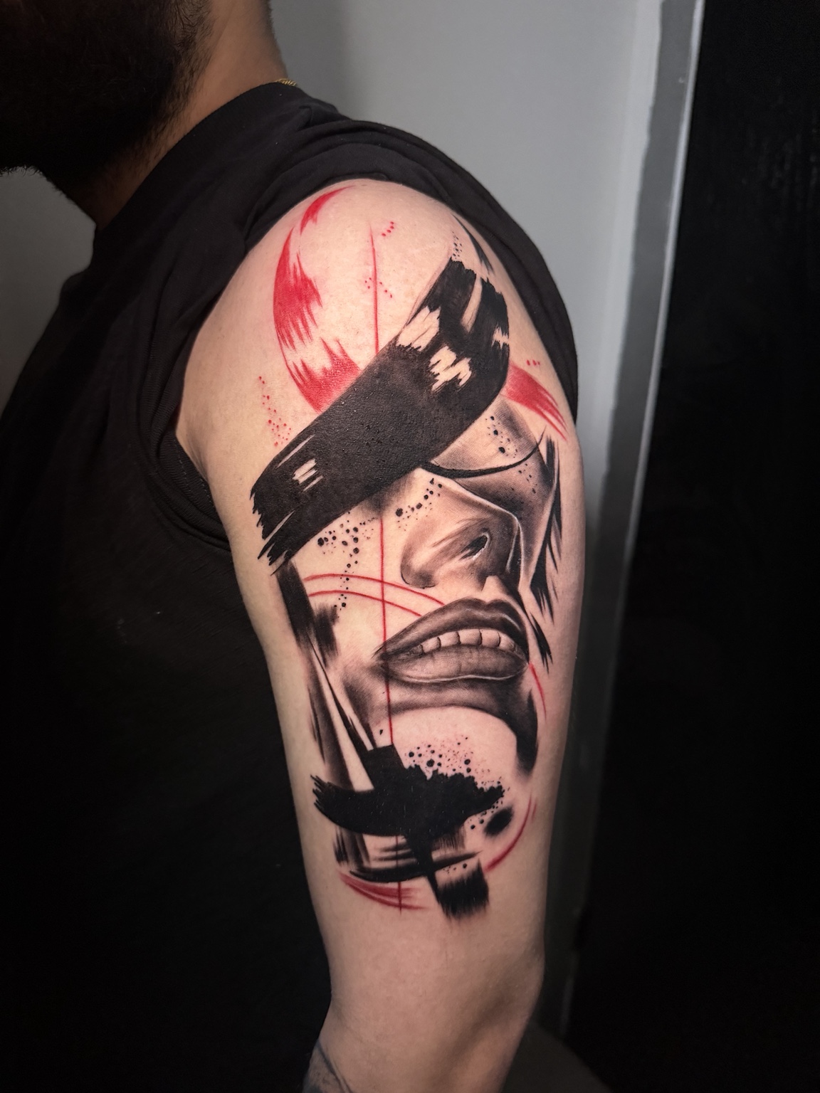 Featured tattoo: black and grey sleeve